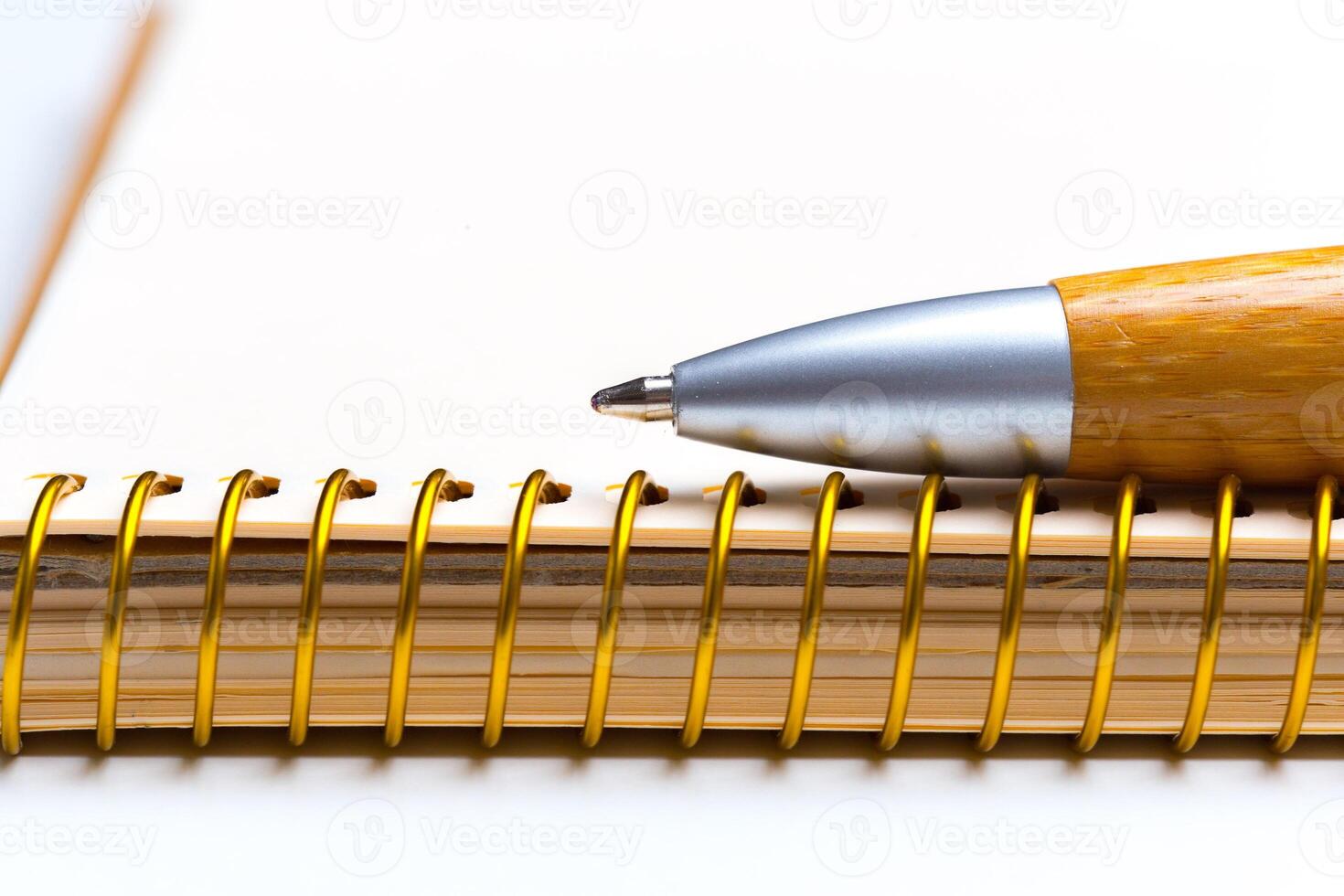 Pen and notebook close up photo