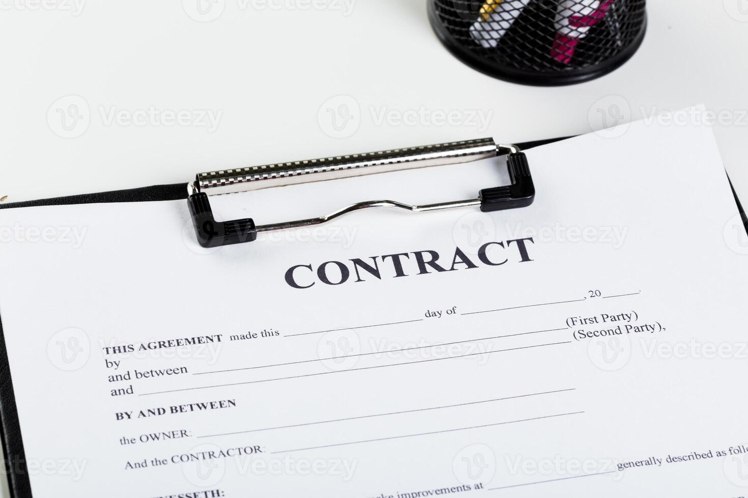 Business contract document with pen photo