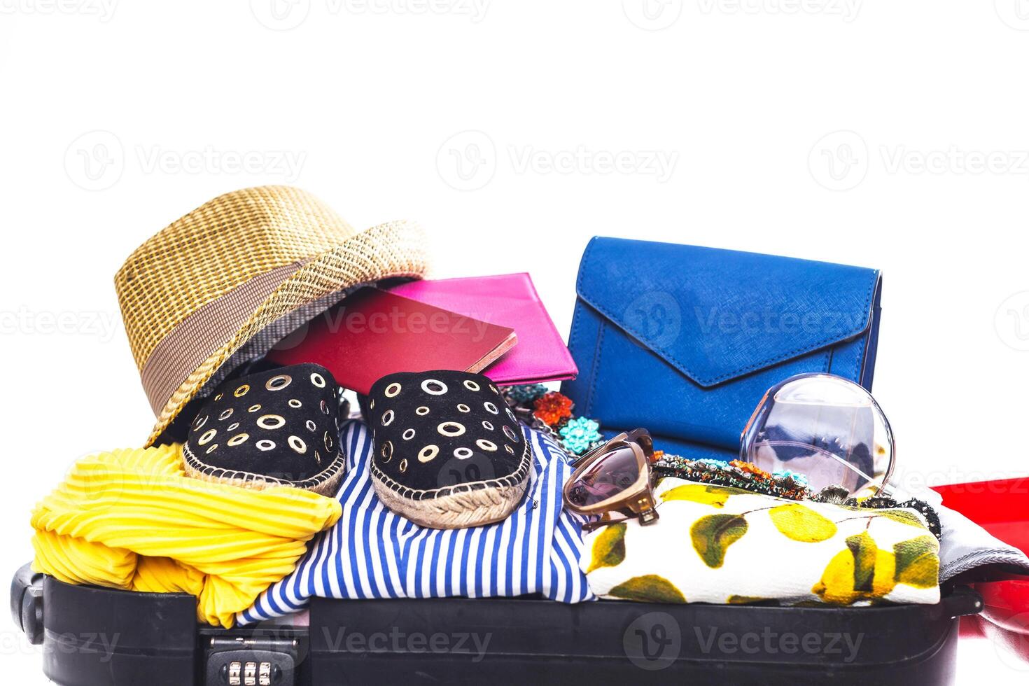 Packing suitcase for trip isolated on white photo