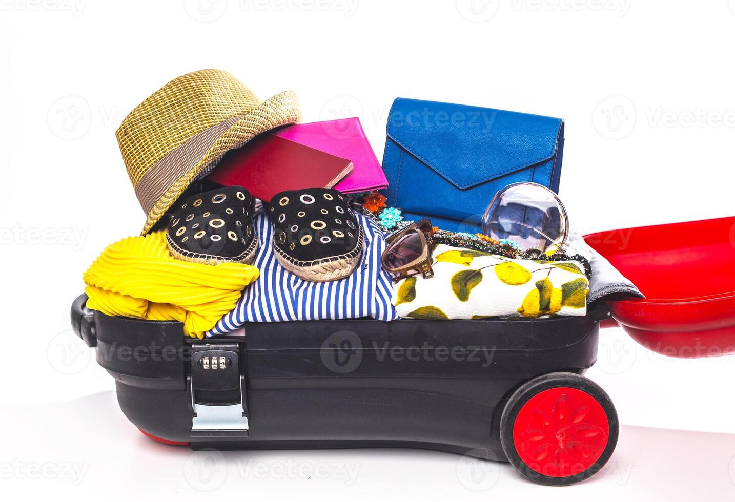 Packing suitcase for trip isolated on white photo