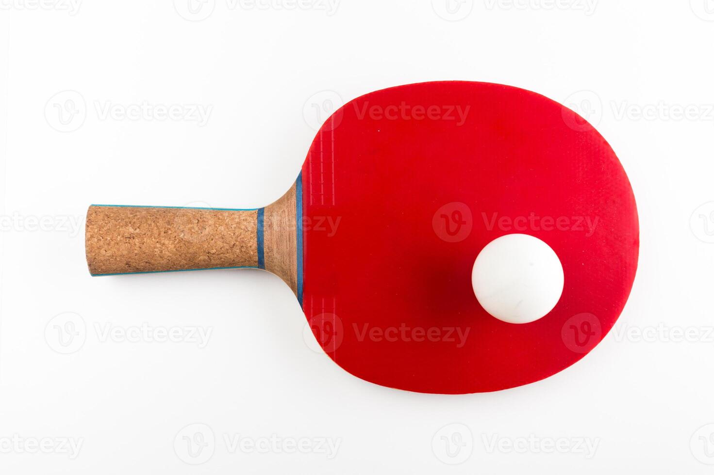 Table tennis racket and ball on a white background photo