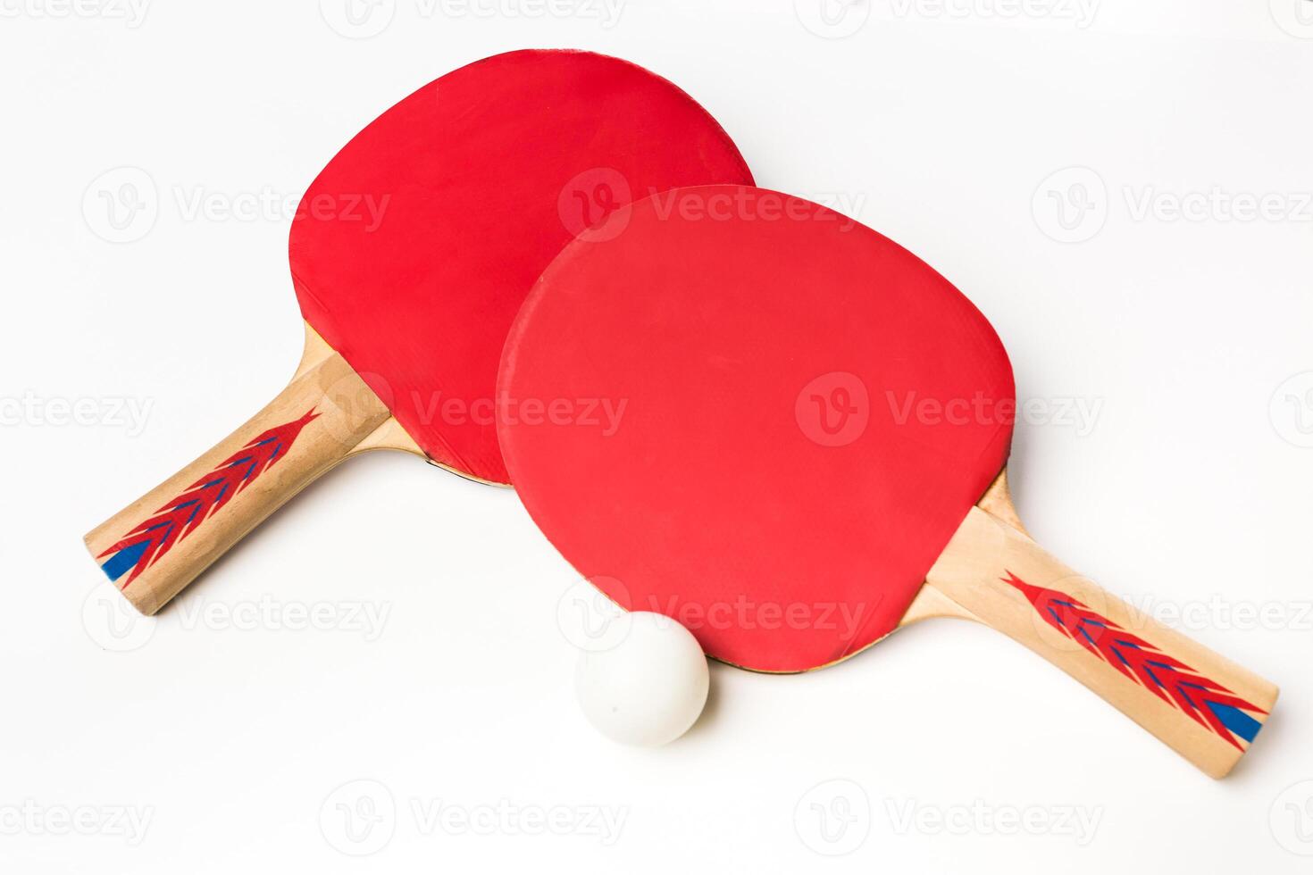 Table tennis racket and ball on a white background photo