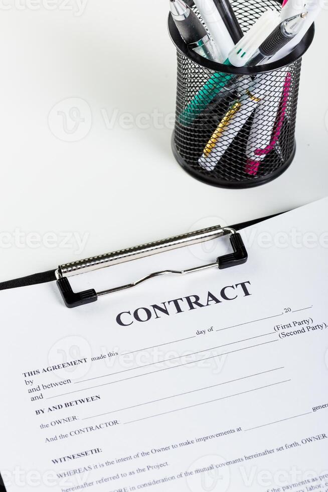 Business contract document with pen photo