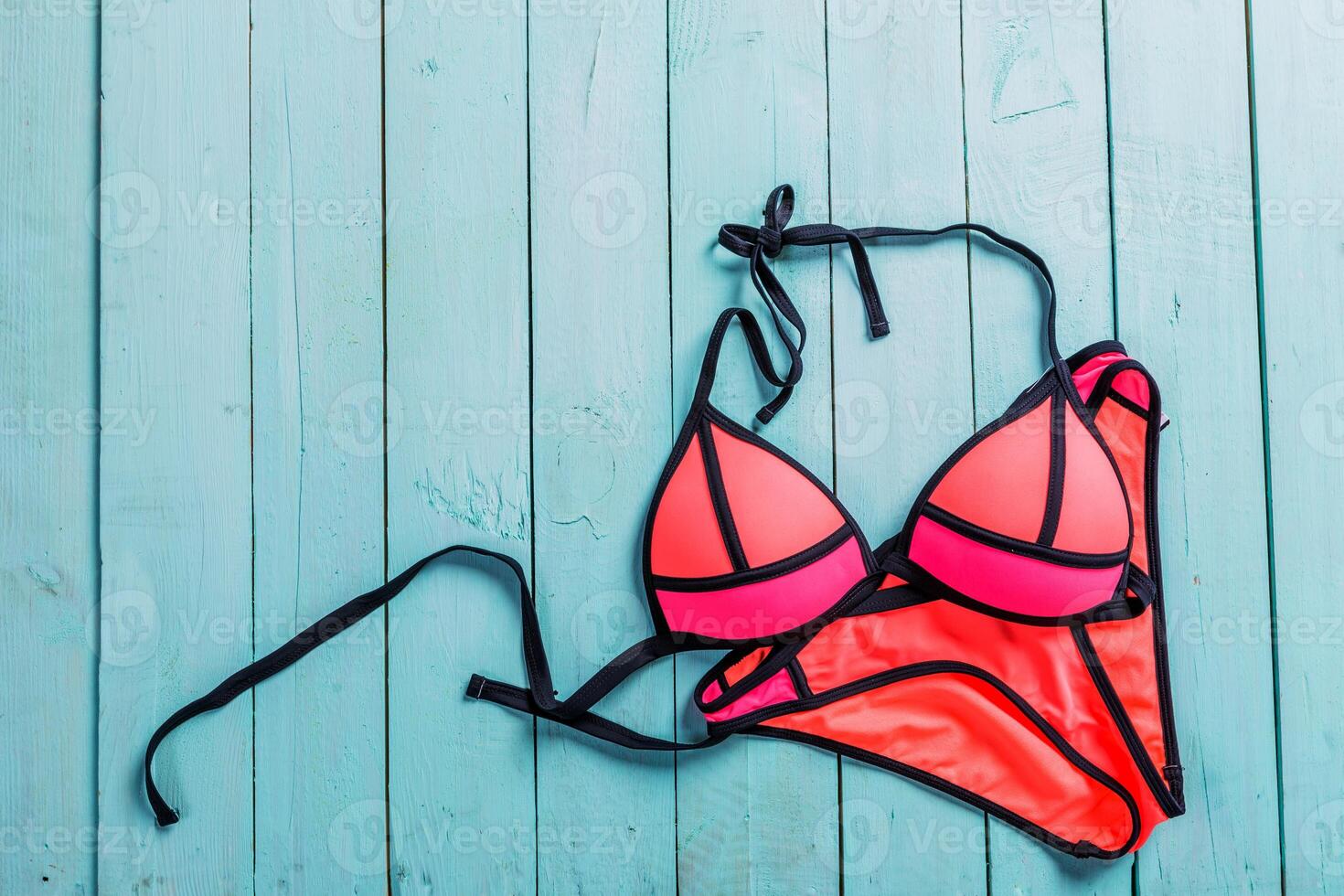 Set of beach clothes. Pink bikini photo