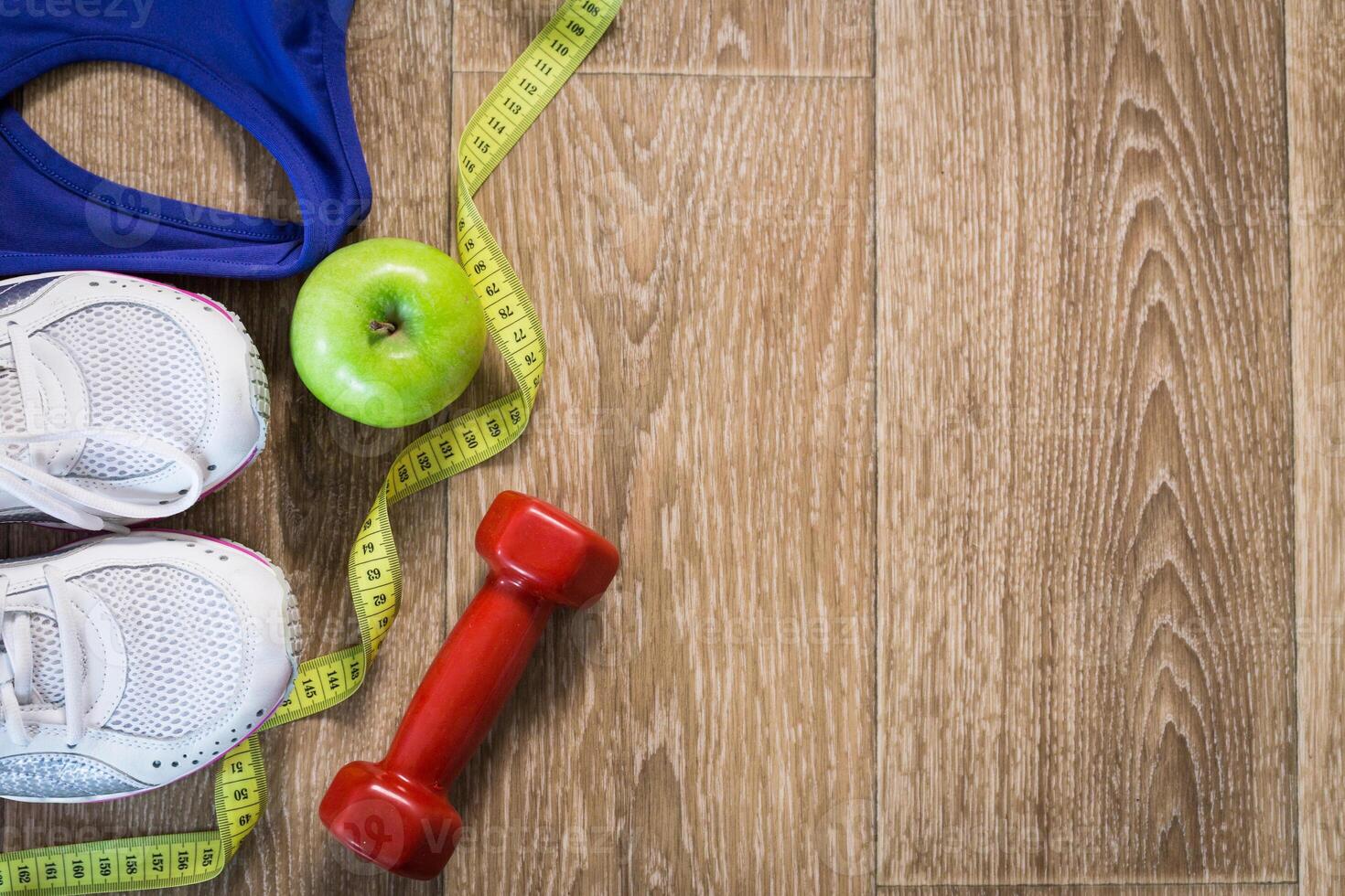 Set for sports activities on tiled floor. photo