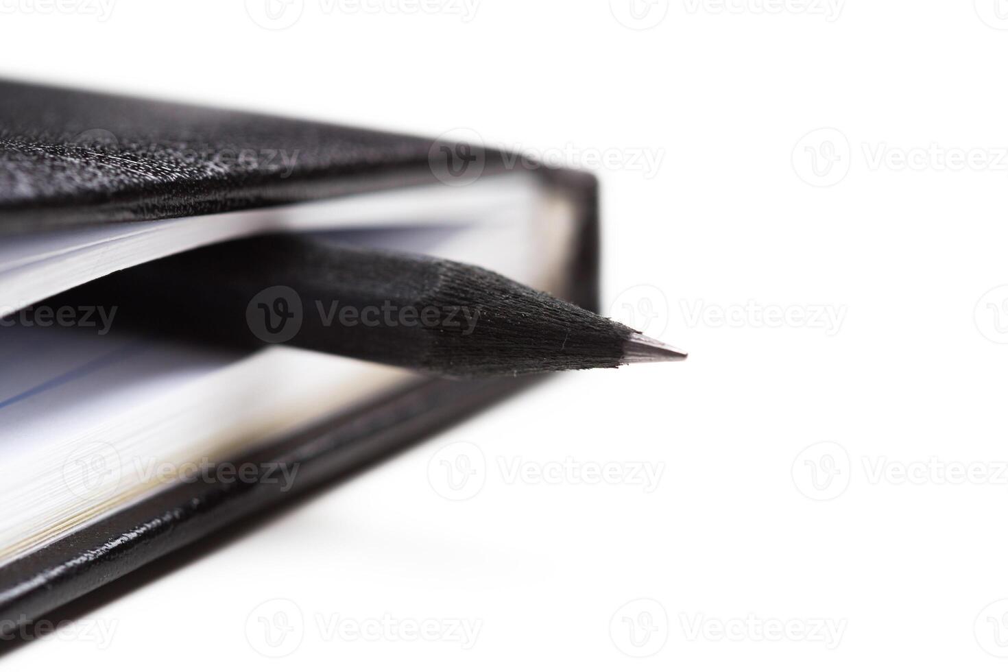 Pen and notebook close up photo