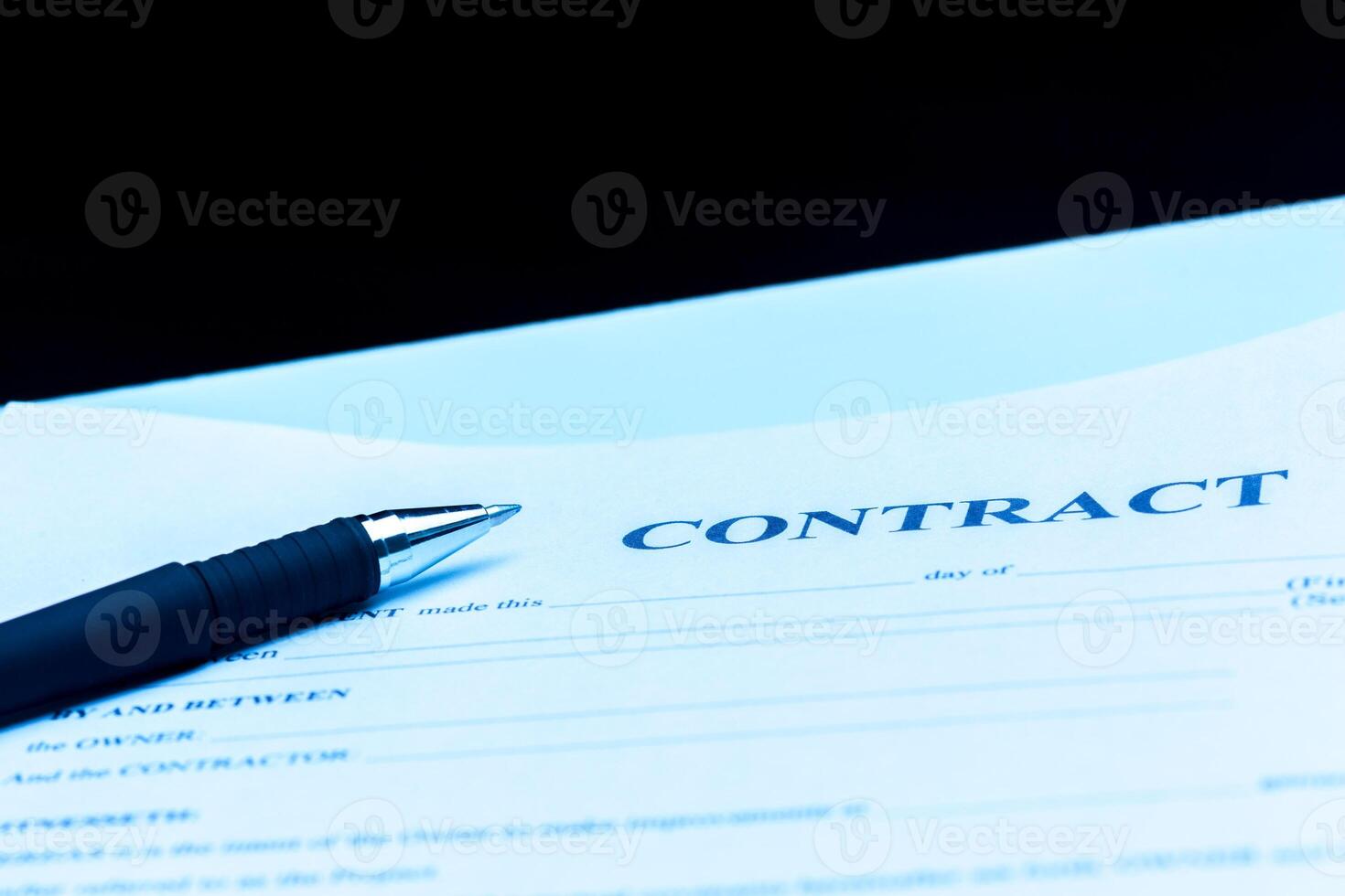 Close-up of pen on contract. photo