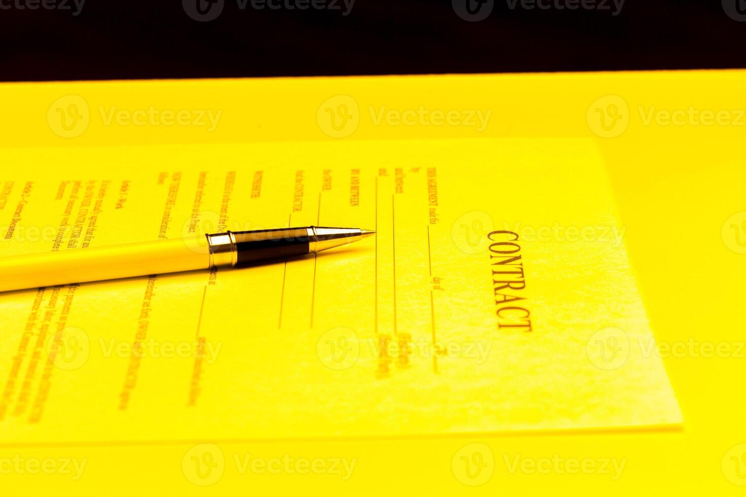 Close-up of pen on contract. photo