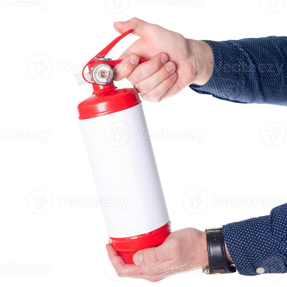 Man using fire extinguisher isolated on white photo
