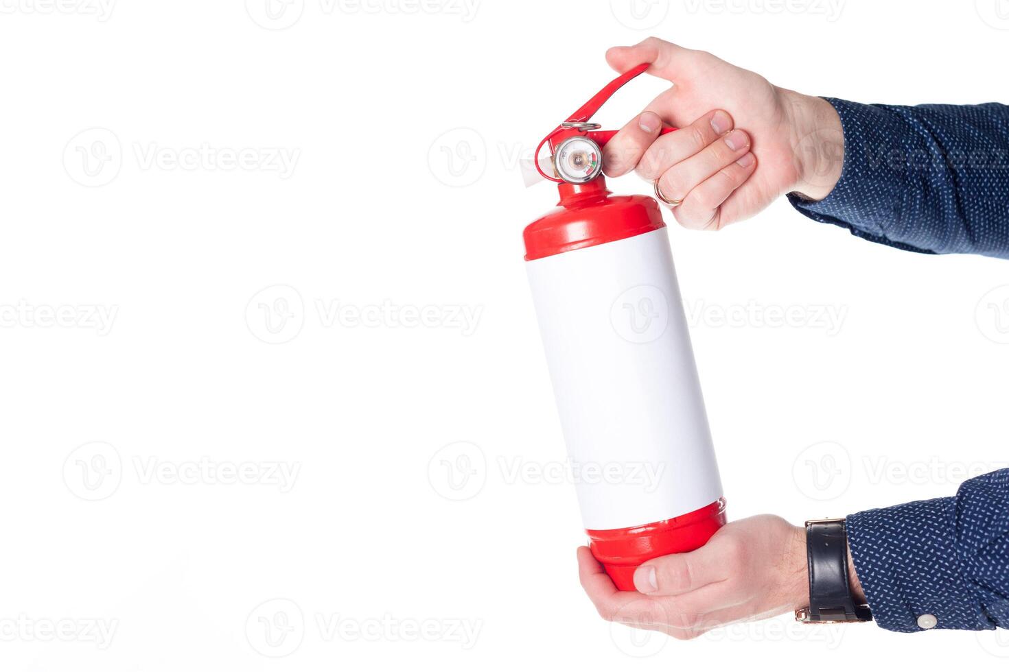 Man using fire extinguisher isolated on white photo