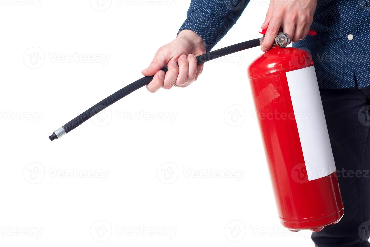 Man using fire extinguisher isolated on white photo