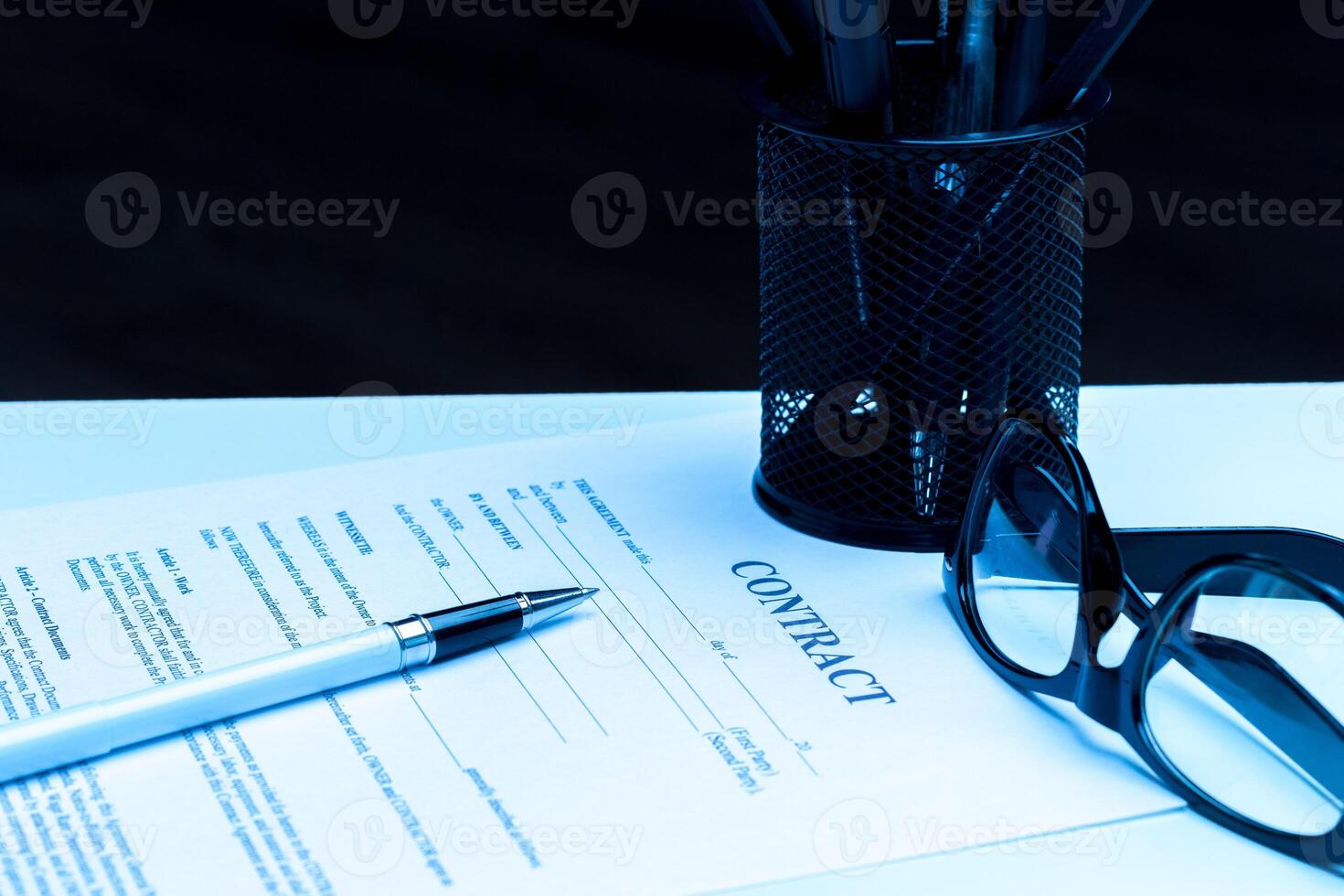 Close-up of pen on contract. photo