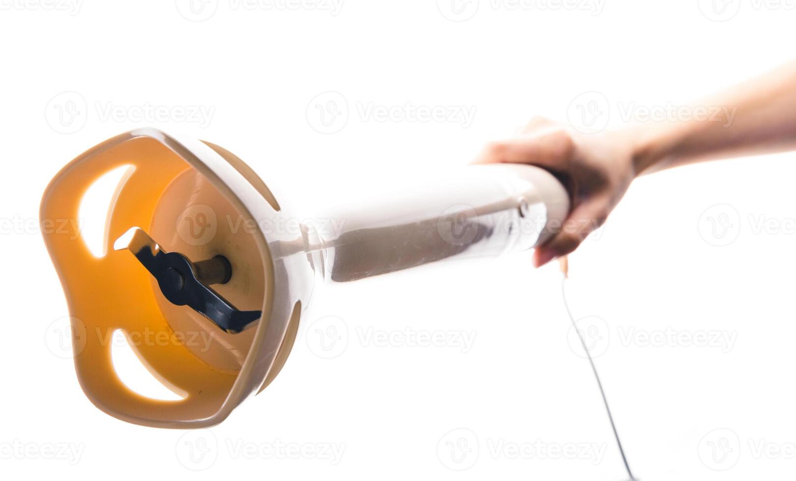 Hand holding a mixer photo