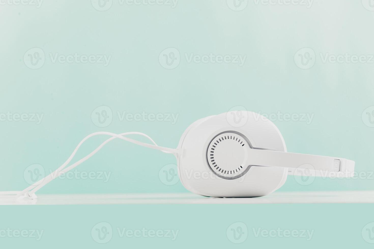 Headphones on blue background photo