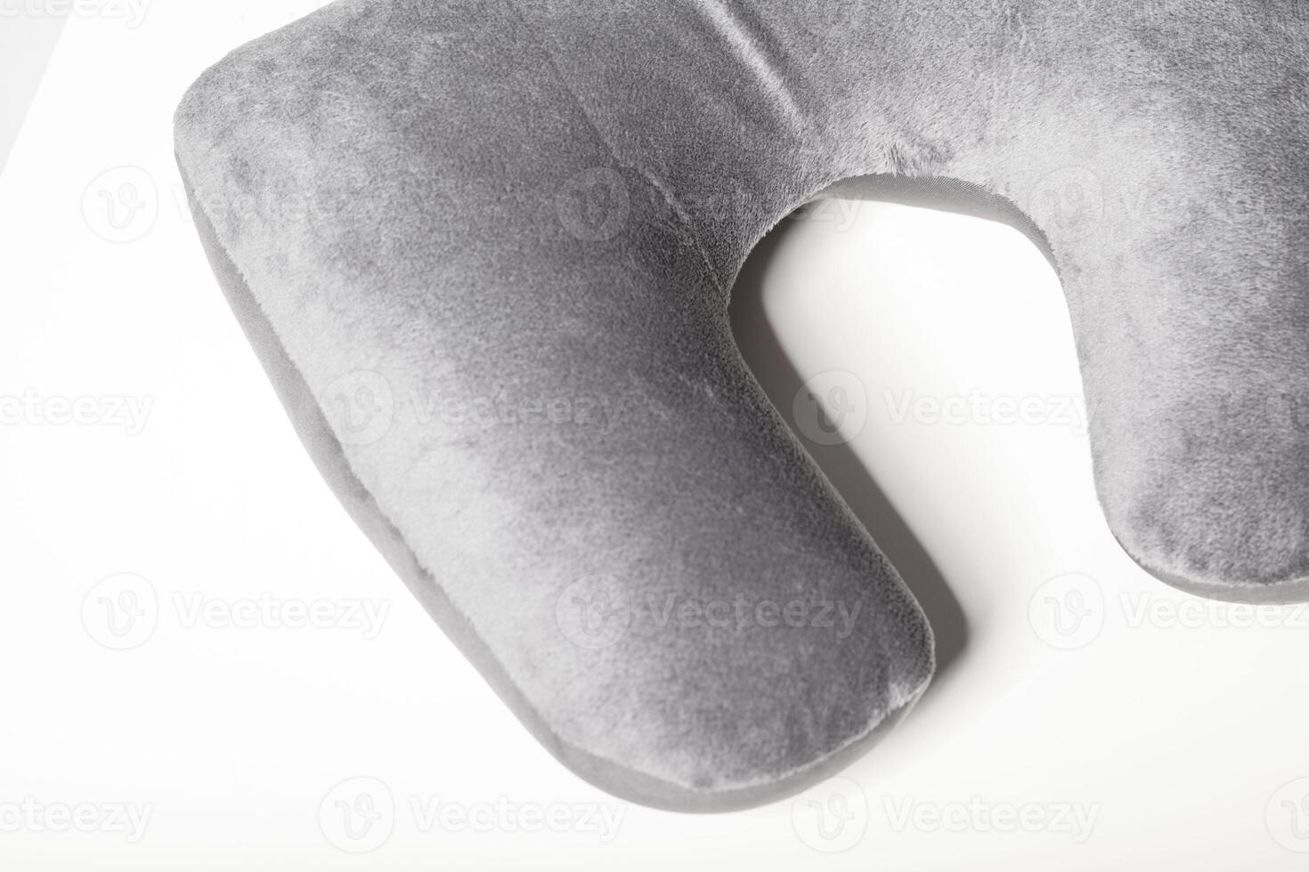 travel cervical pillow isolated on a white background photo