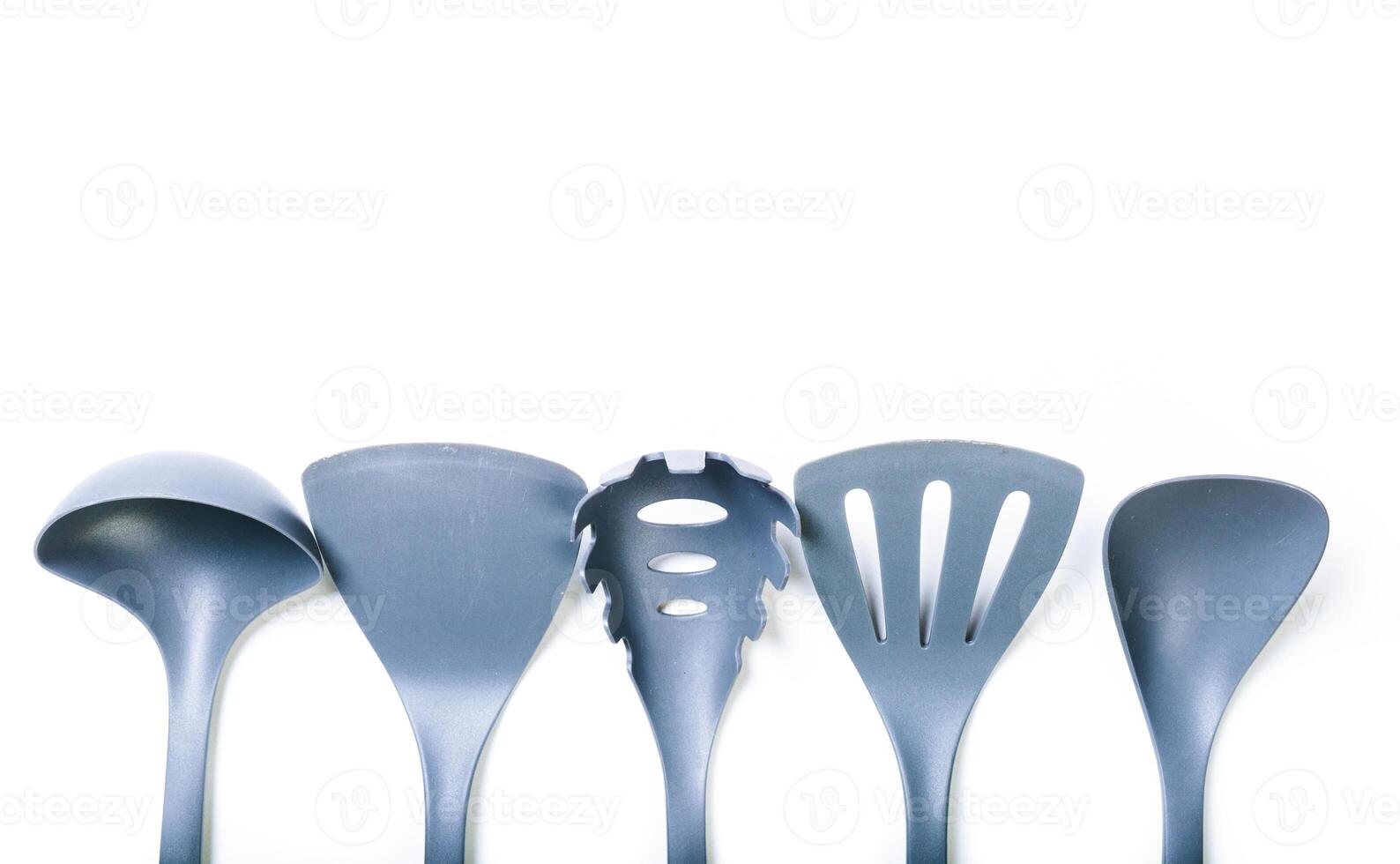 kitchen utensils isolated on white photo