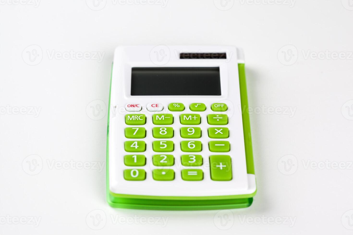 Top view of a calculator isolated on white background photo