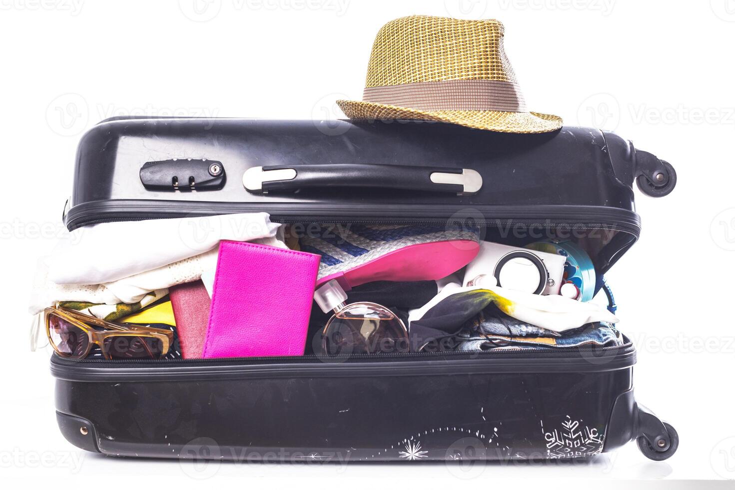 Packing suitcase for trip isolated on white photo