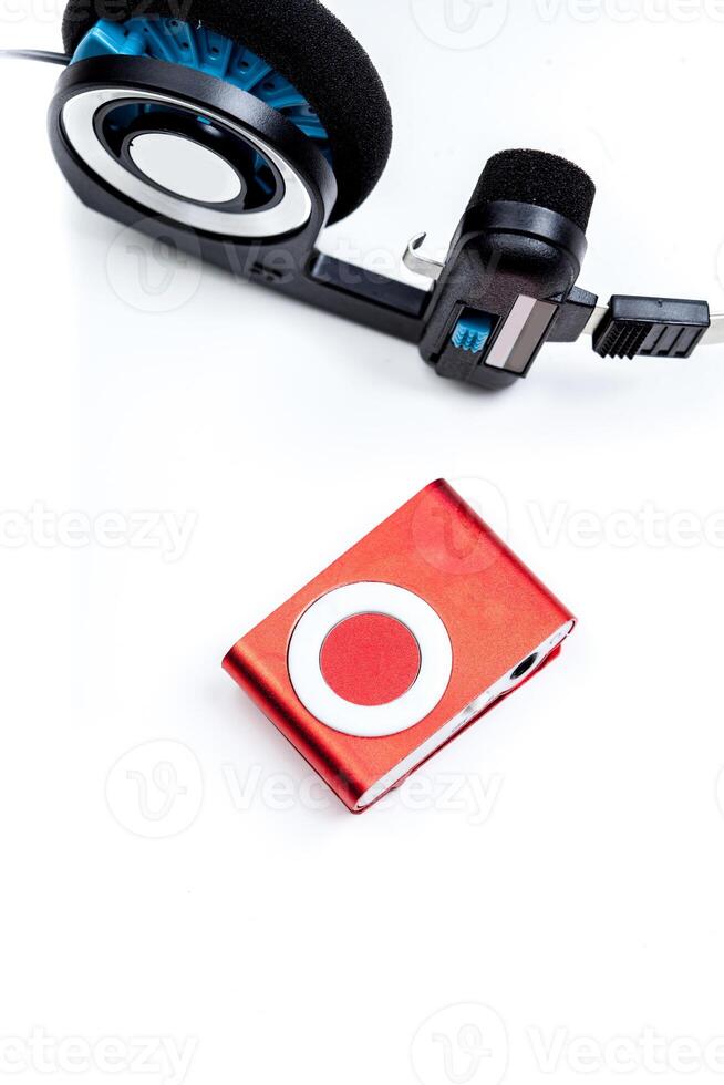 audio player with headphones isolated on white background photo