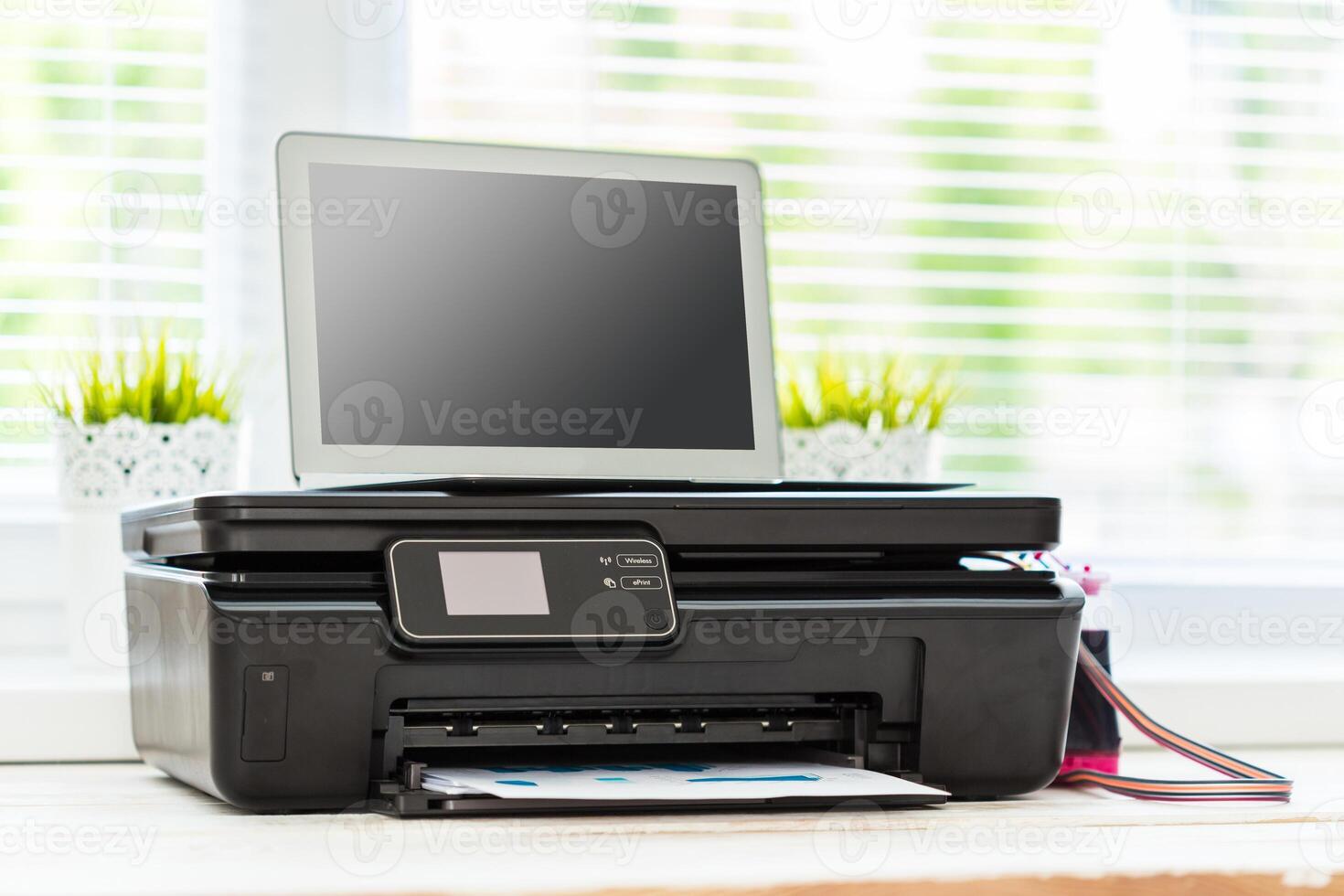 Printer and computer. Office table photo
