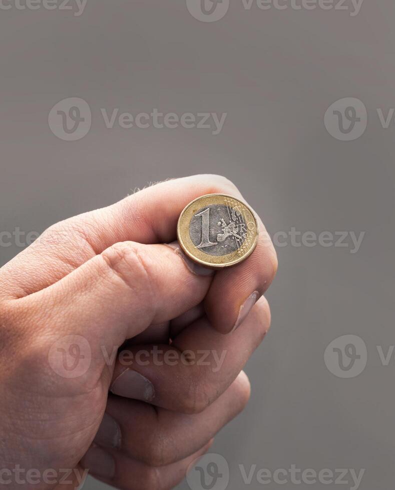 Tossing Euro coin, heads or tails you decide photo