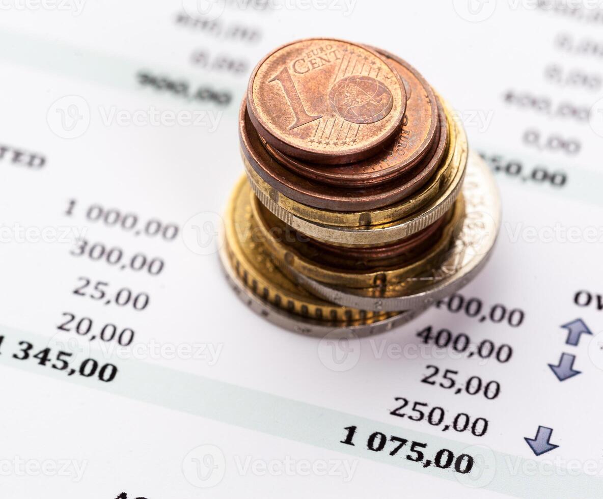 Graph Of Stock Market With Stacks Of Coins photo