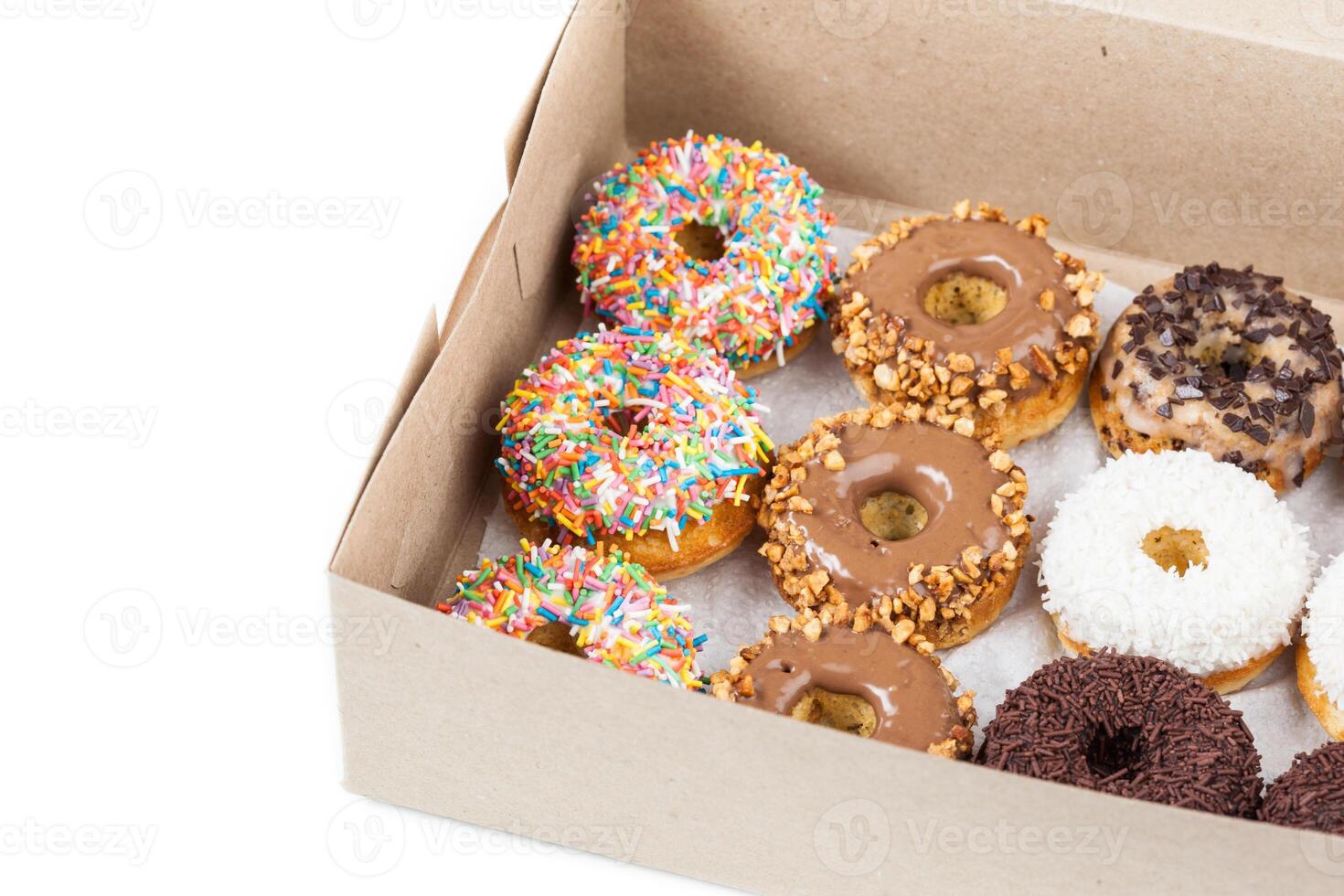 sweet donuts in a paper box photo