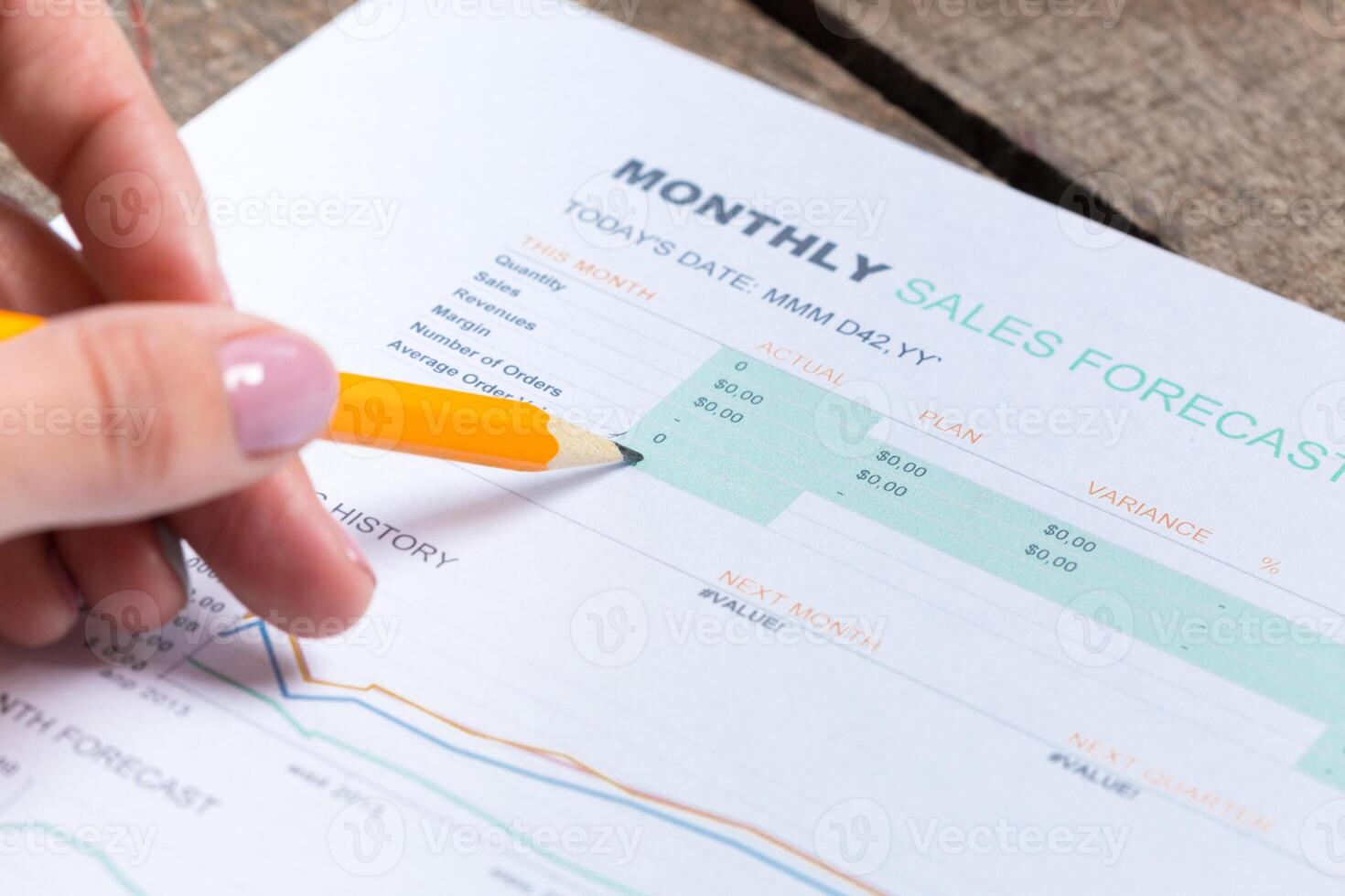 Business graph and ballpoint pen. Close-up. photo