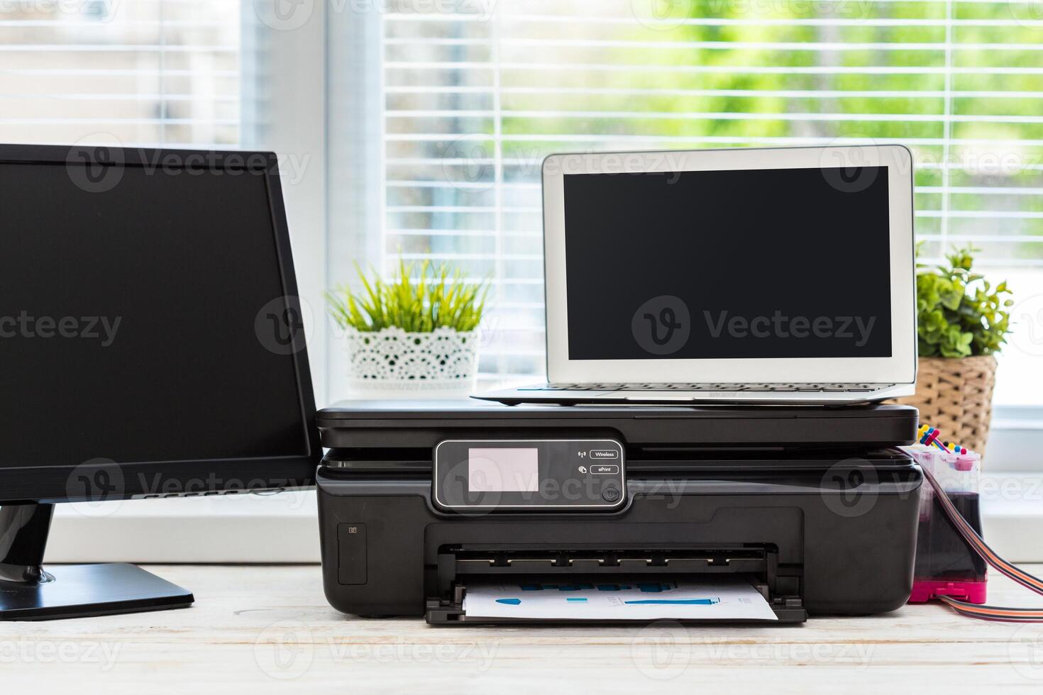 Printer and computer. Office table photo