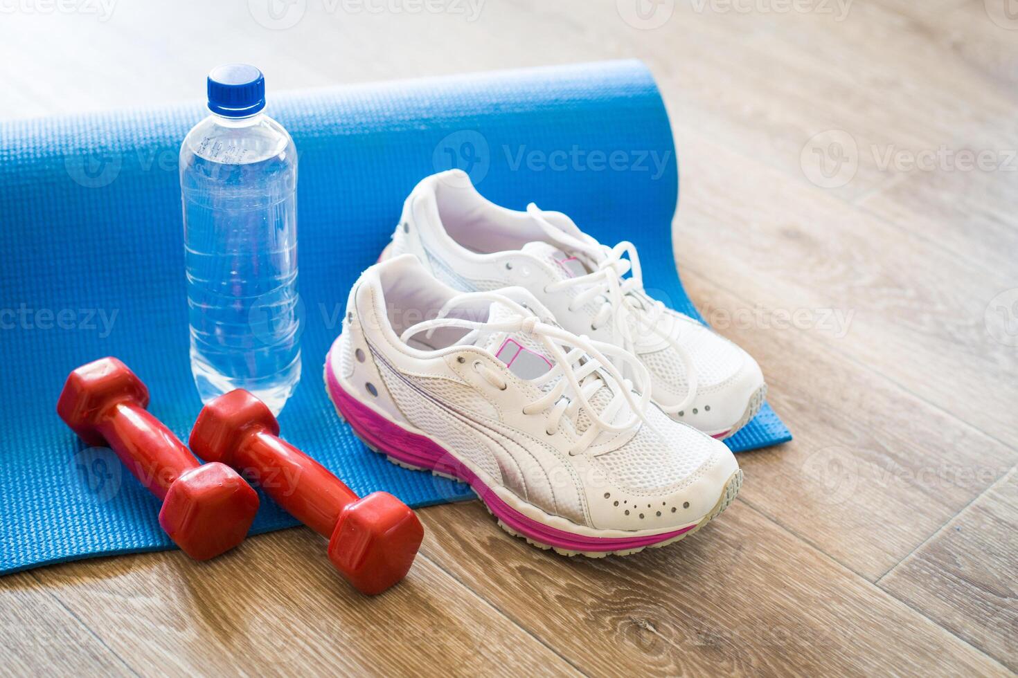 Set for sports activities on tiled floor photo