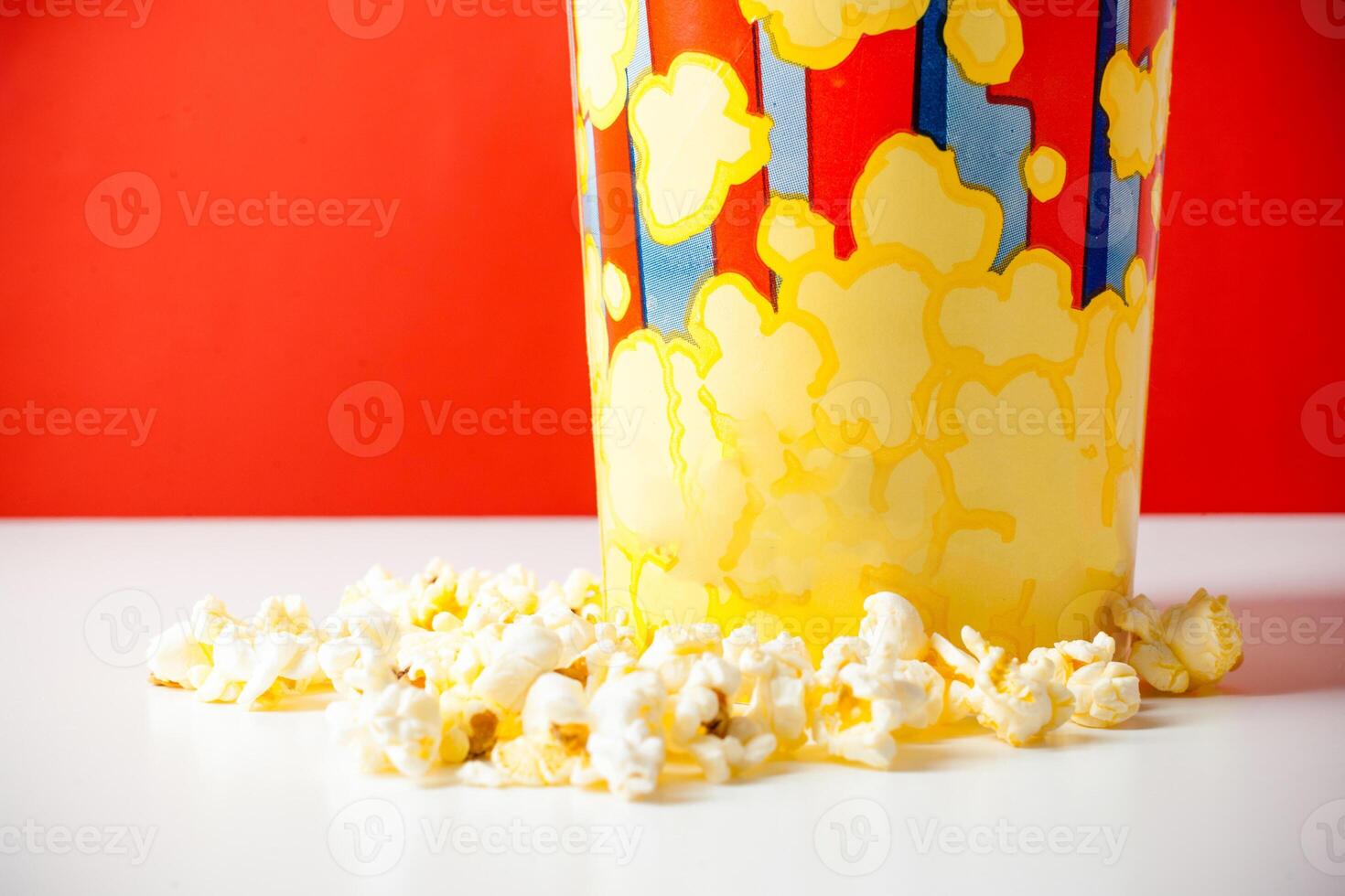 Popcorn in striped bucket photo