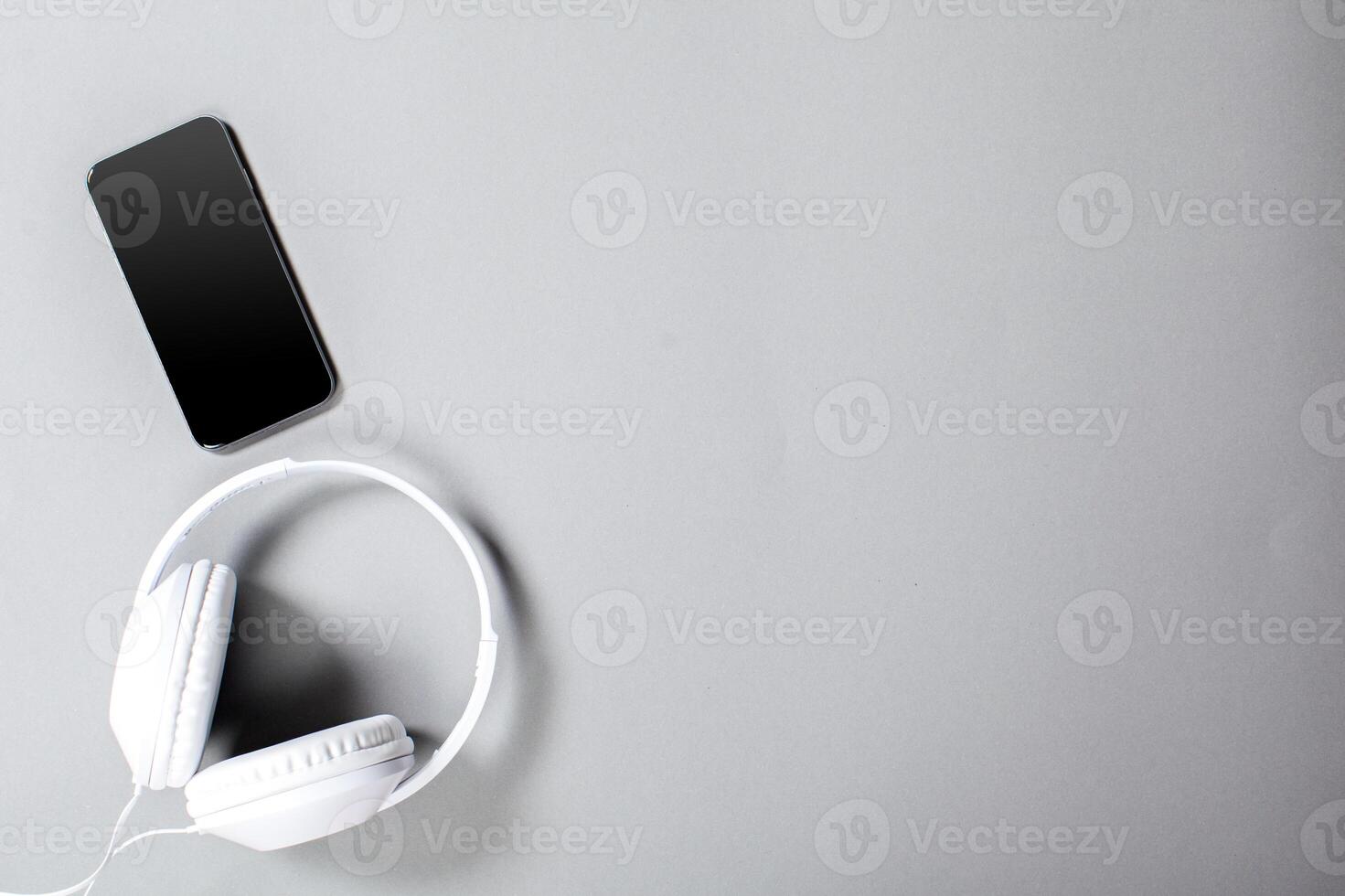 Audio Headphones with Cord on Grey Background photo