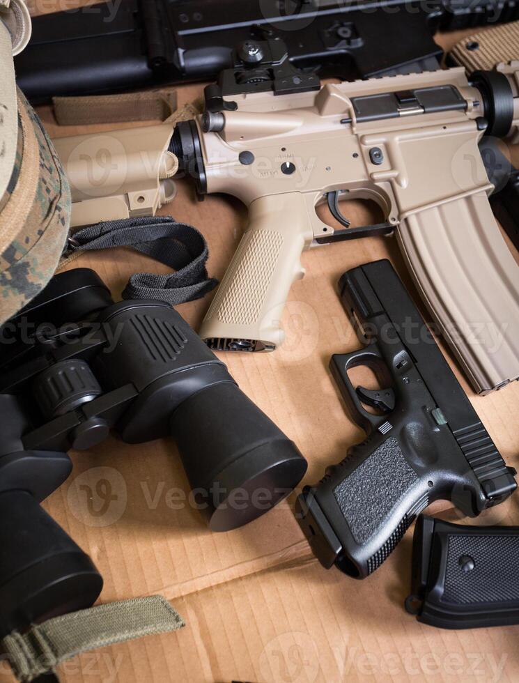 Assault rifle, gun, knife with sheath, compass photo