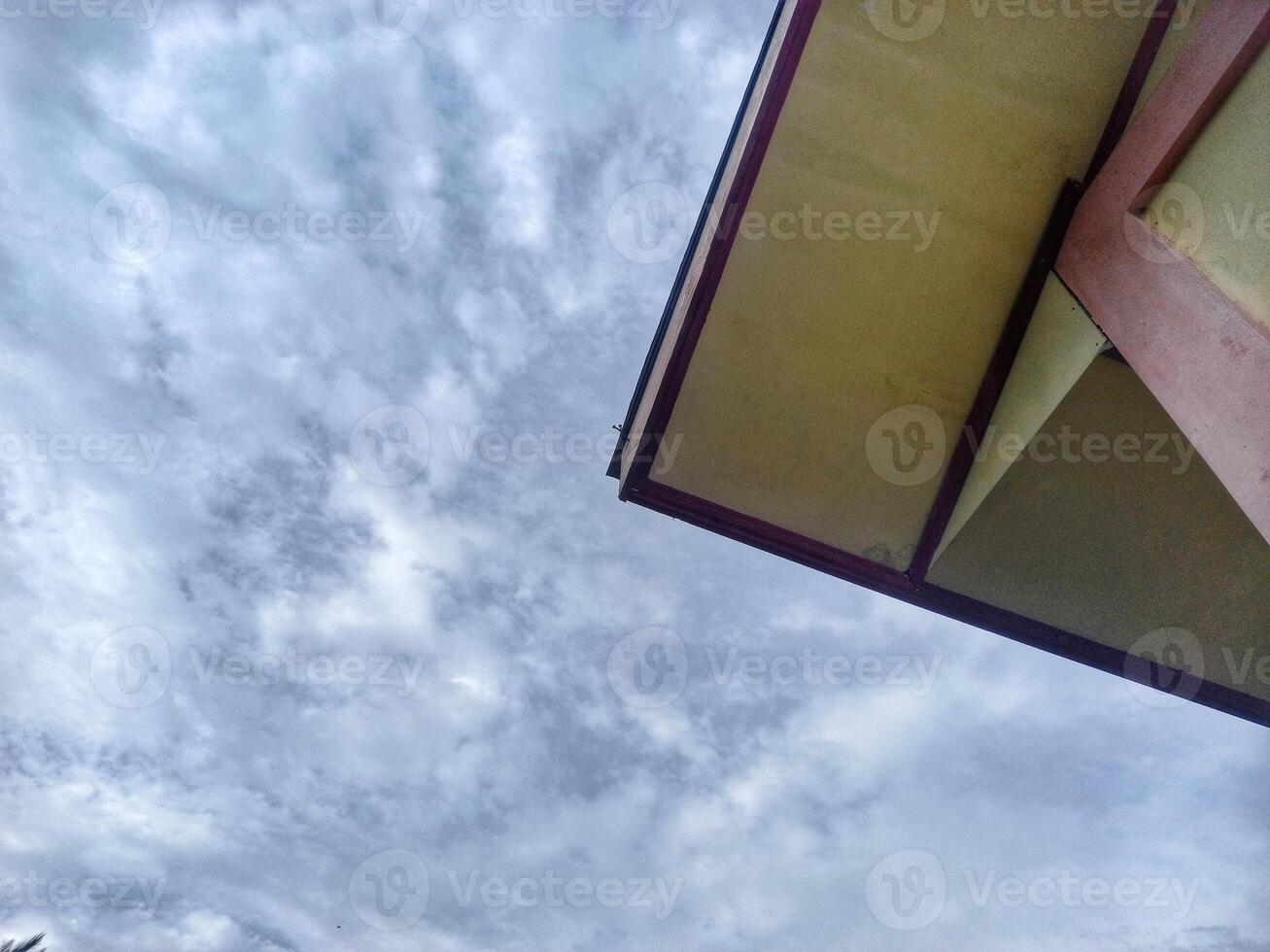 roof of building and clear blue sky photo
