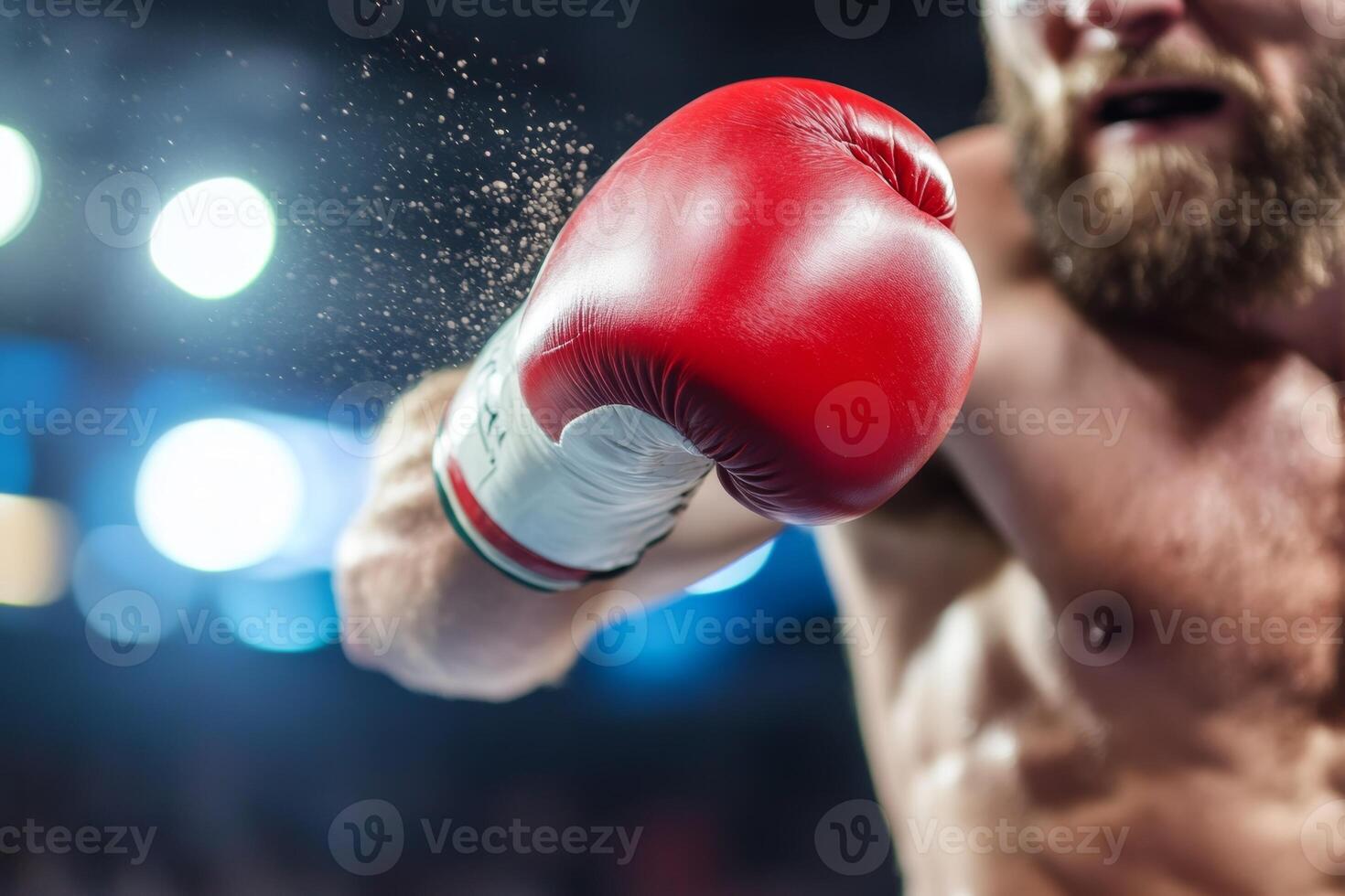 A boxer delivers a powerful punch during a competitive match inside a well-lit arena photo