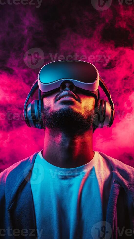 A person experiences virtual reality in a colorful, immersive environment with headphones and VR headset, surrounded by vibrant lighting effects photo