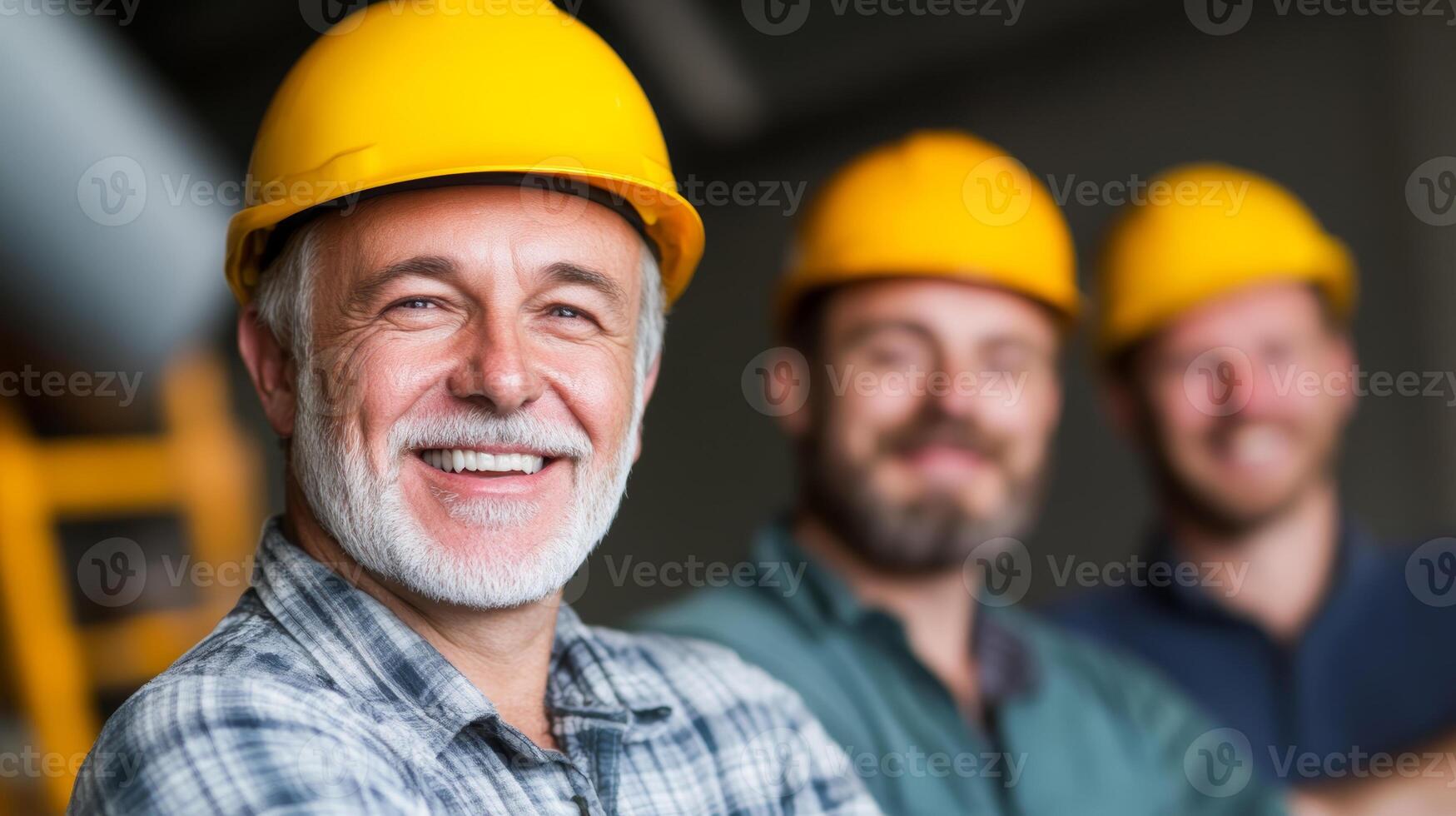 Group of workers wearing hard hats smiling together in a construction site during the day photo