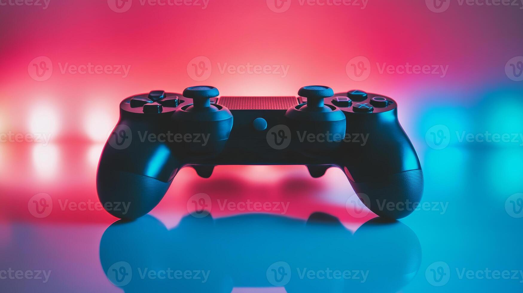 A close-up view of a modern gaming controller on a reflective surface with colorful lights in the background, creating a vibrant atmosphere photo