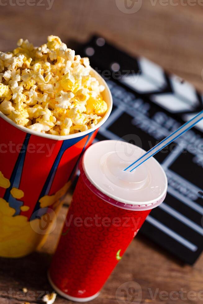 Popcorn bowl and drink photo
