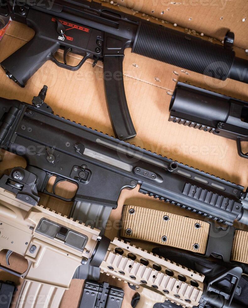 Assault rifle, gun, knife with sheath, compass photo