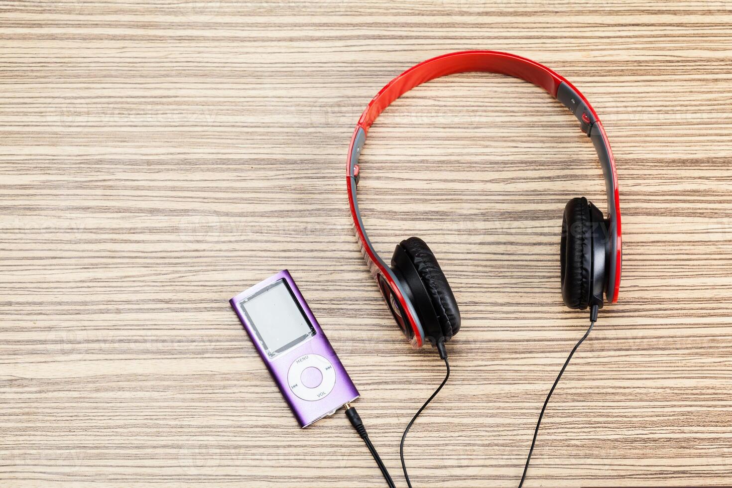 headphones on wooden background photo