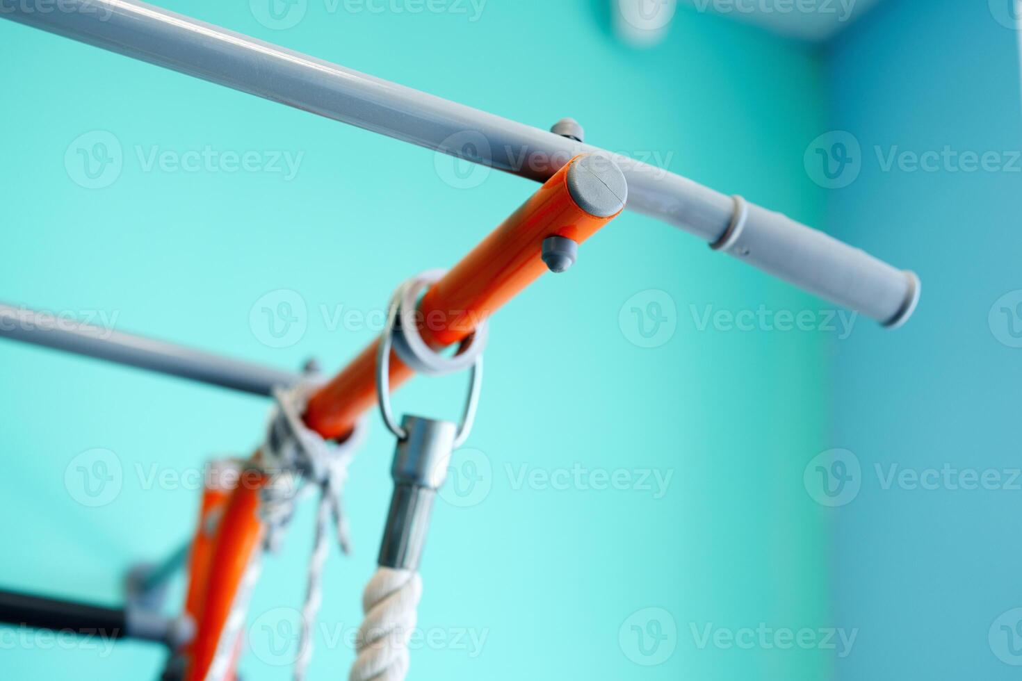 Fitness equipment in a modern gym with a vibrant blue background showcasing an active lifestyle environment photo
