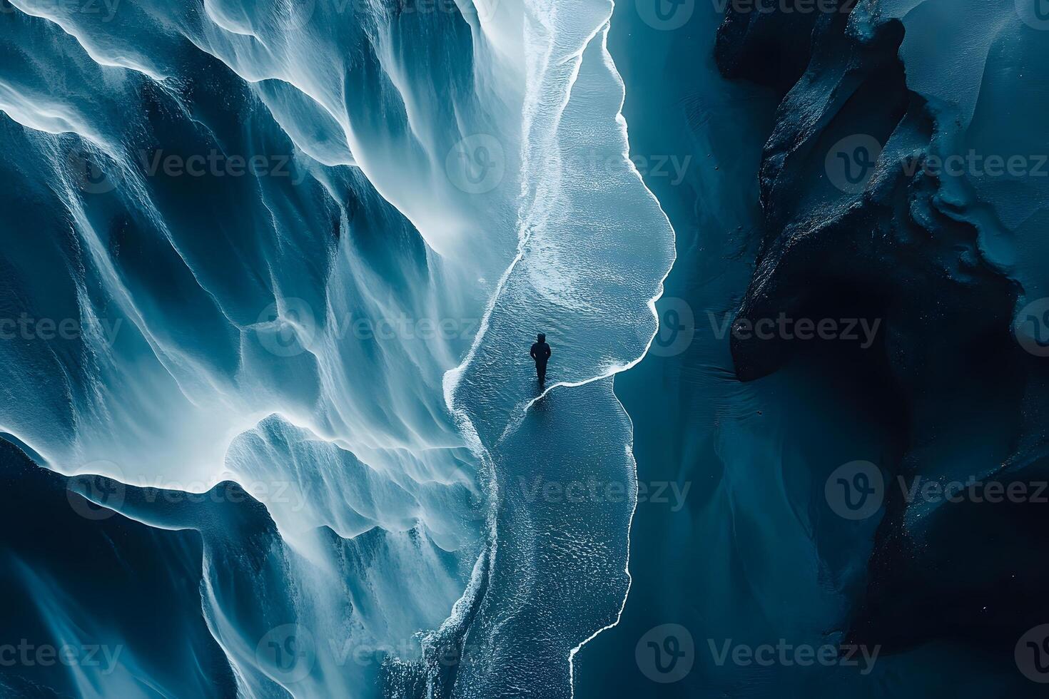 Solitary Journey Exploring Mesmerizing Ice Formations in a Winter Wonderland photo