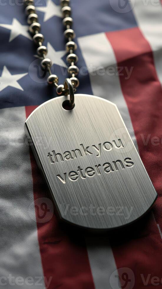 Dog tag displaying gratitude for veterans on an American flag background photo