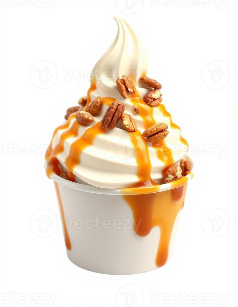 Delicious soft serve ice cream topped with caramel sauce and crunchy pecans served in a cup photo