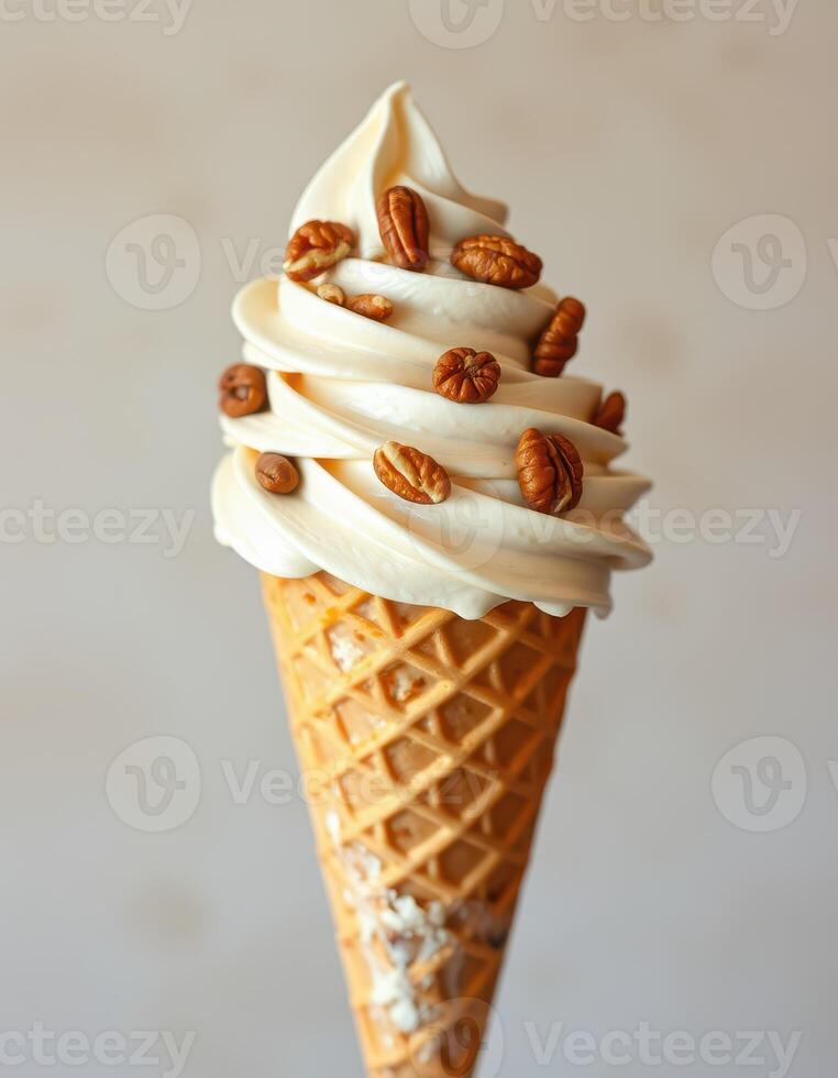 Delicious soft serve ice cream topped with crunchy nuts in a waffle cone on a neutral background photo