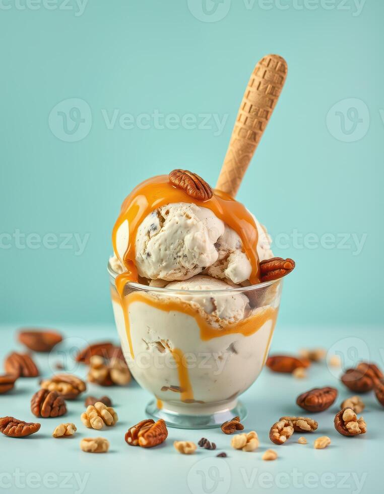Decadent ice cream topped with caramel sauce, nuts, and a waffle cone against a pastel blue background photo
