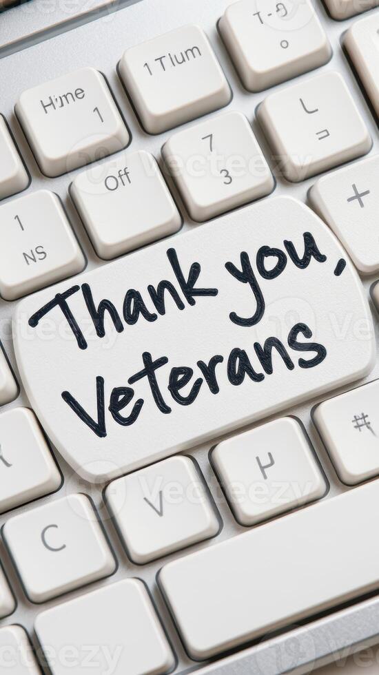 Thoughtful message of gratitude displayed on a computer keyboard honoring veterans photo