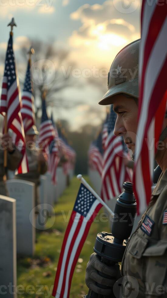 Soldiers pay tribute during a solemn memorial ceremony at a military cemetery adorned with American flags photo