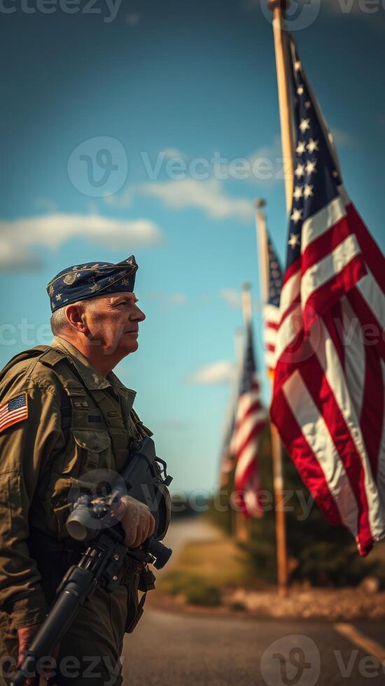 Veteran stands in honor beside American flags during remembrance ceremony in early autumn photo